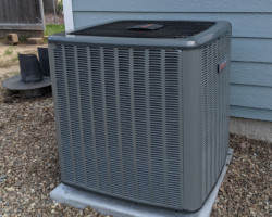 And the outside compressor for the system, sited such that the lines run safely around the layout once entering the basement.