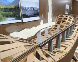 Test fitting the span.  You can see the rough alignment of the old trestle in the background.